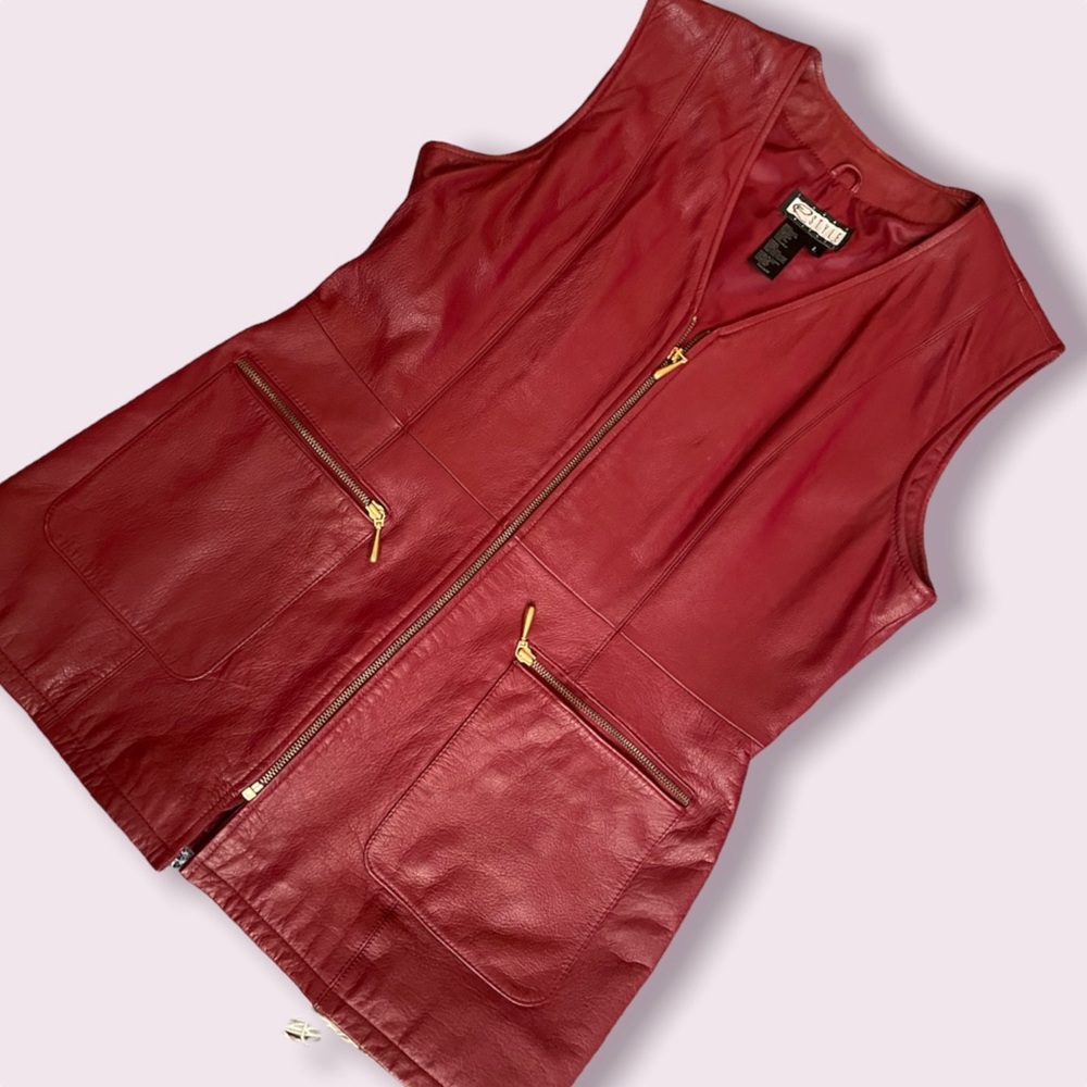 Beautiful deep red 100% leather vest with satin lining. Size large.